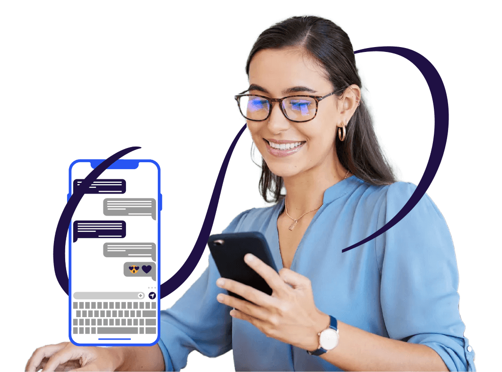 Woman using a mobile phone at a desk