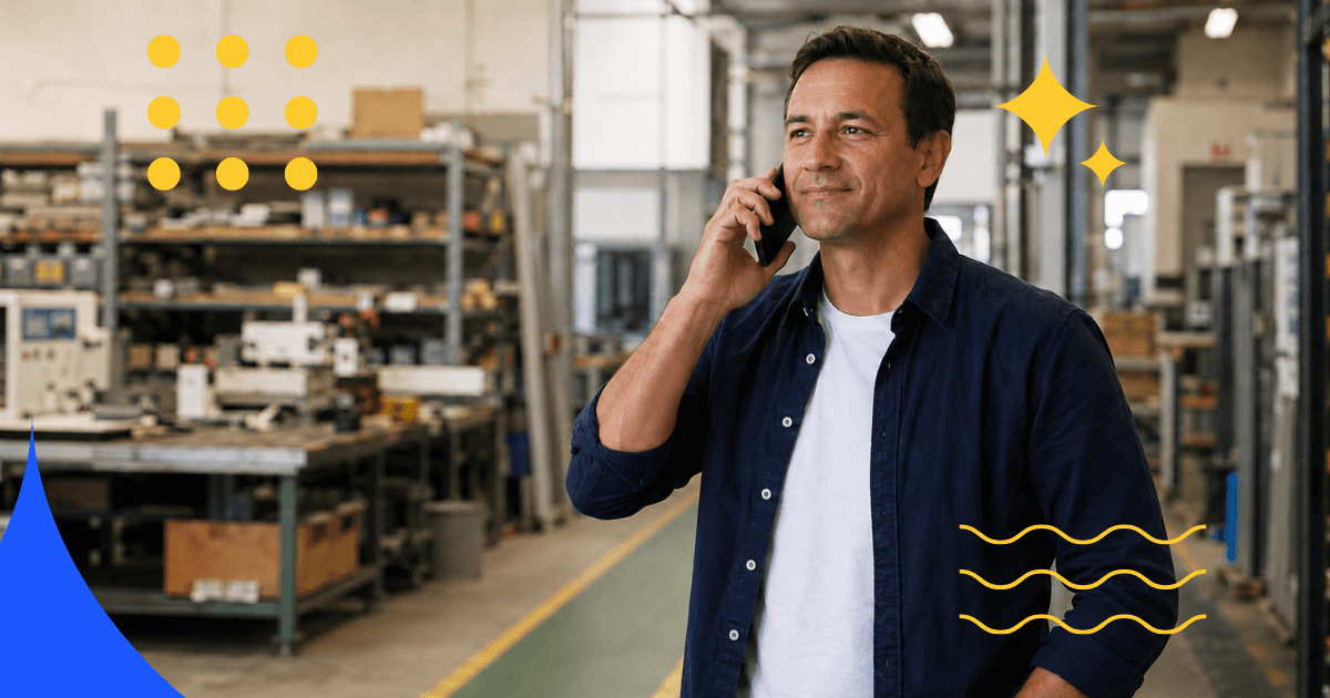 Man on the phone on a factory floor